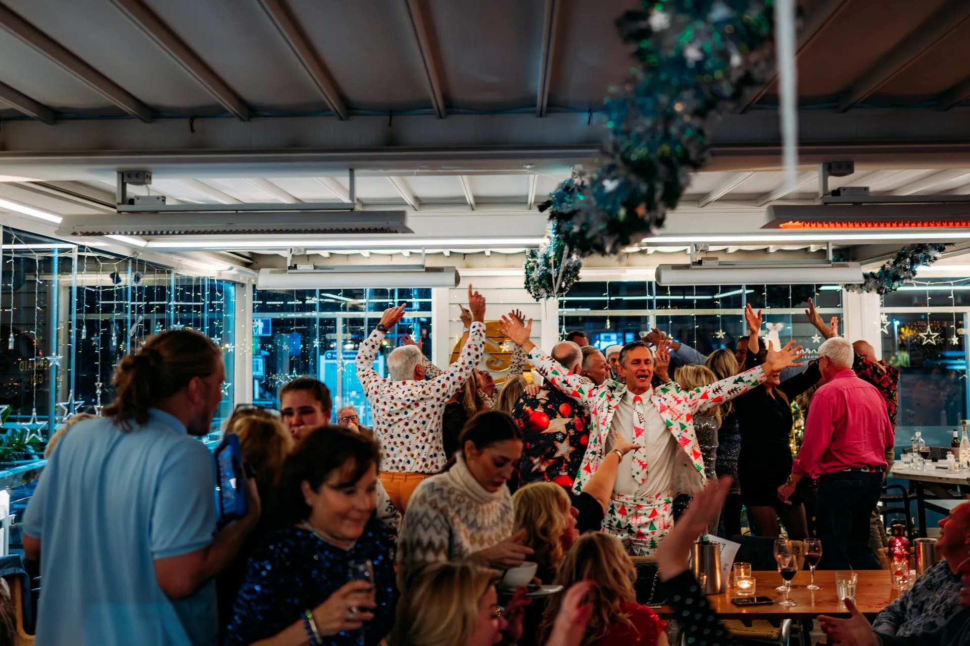 A Christmas party in full swing in the Pergola at Port Hamble